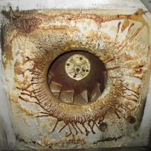 Photo of a dirty resturant hood.