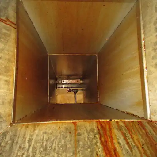 Photo of a dirty resturant hood.